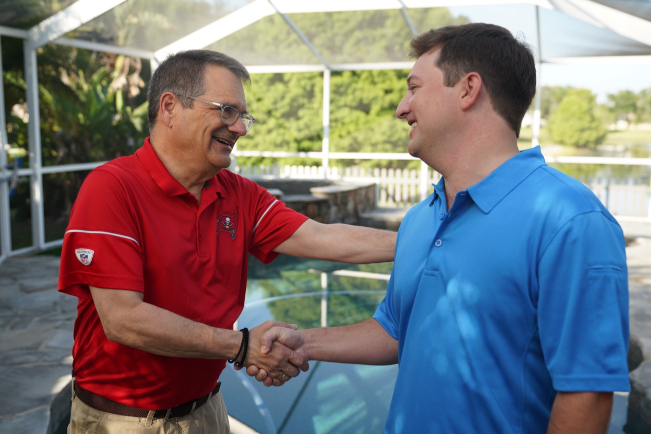 Gus Bilirakis greeting a constituent