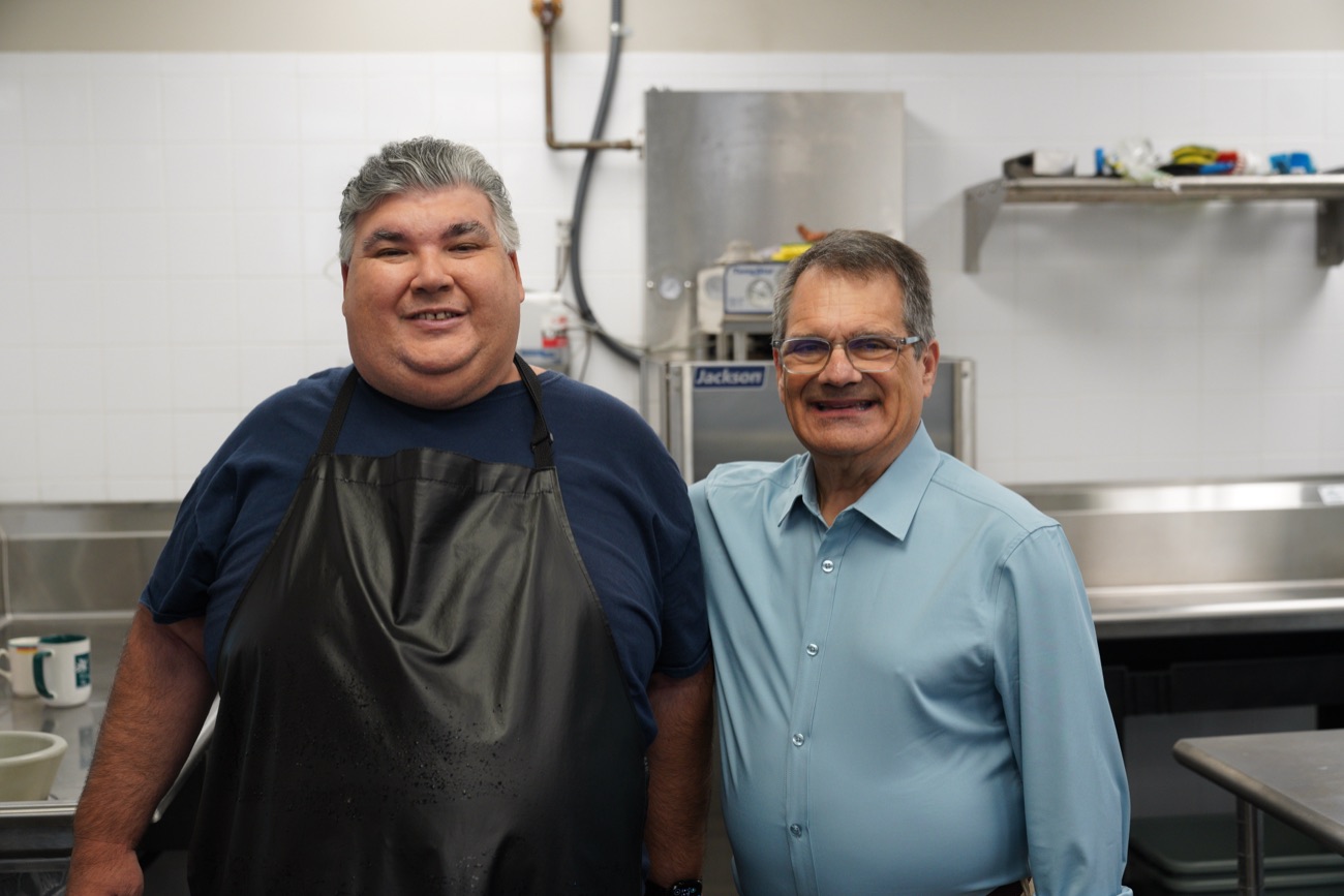 Gus Bilirakis with a community volunteer